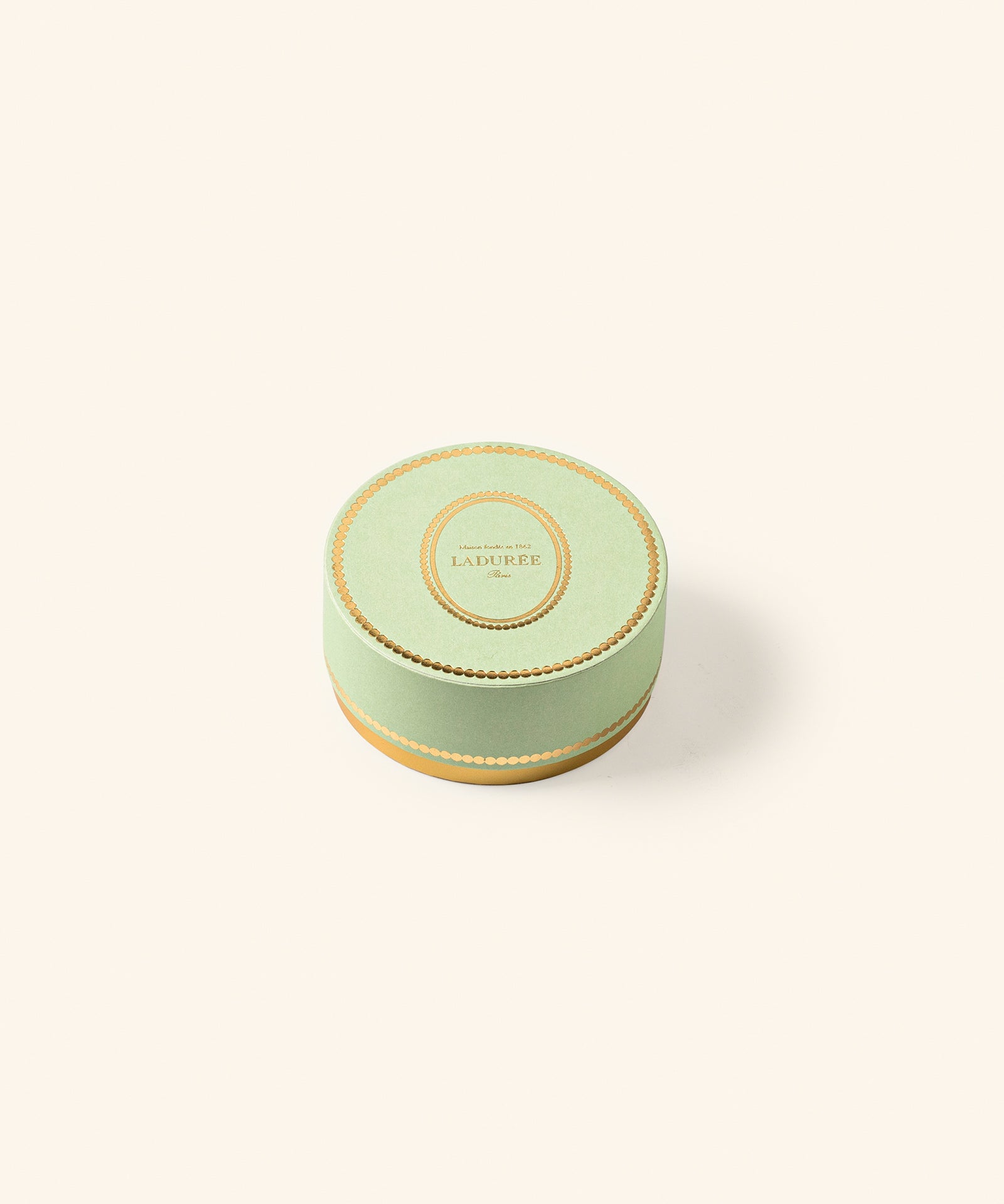 Box of pistachio and orange blossom chocolate pearls