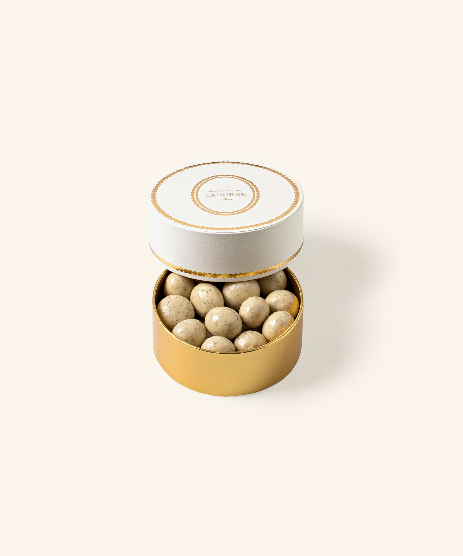 Box of hazelnut and vanilla chocolate pearls