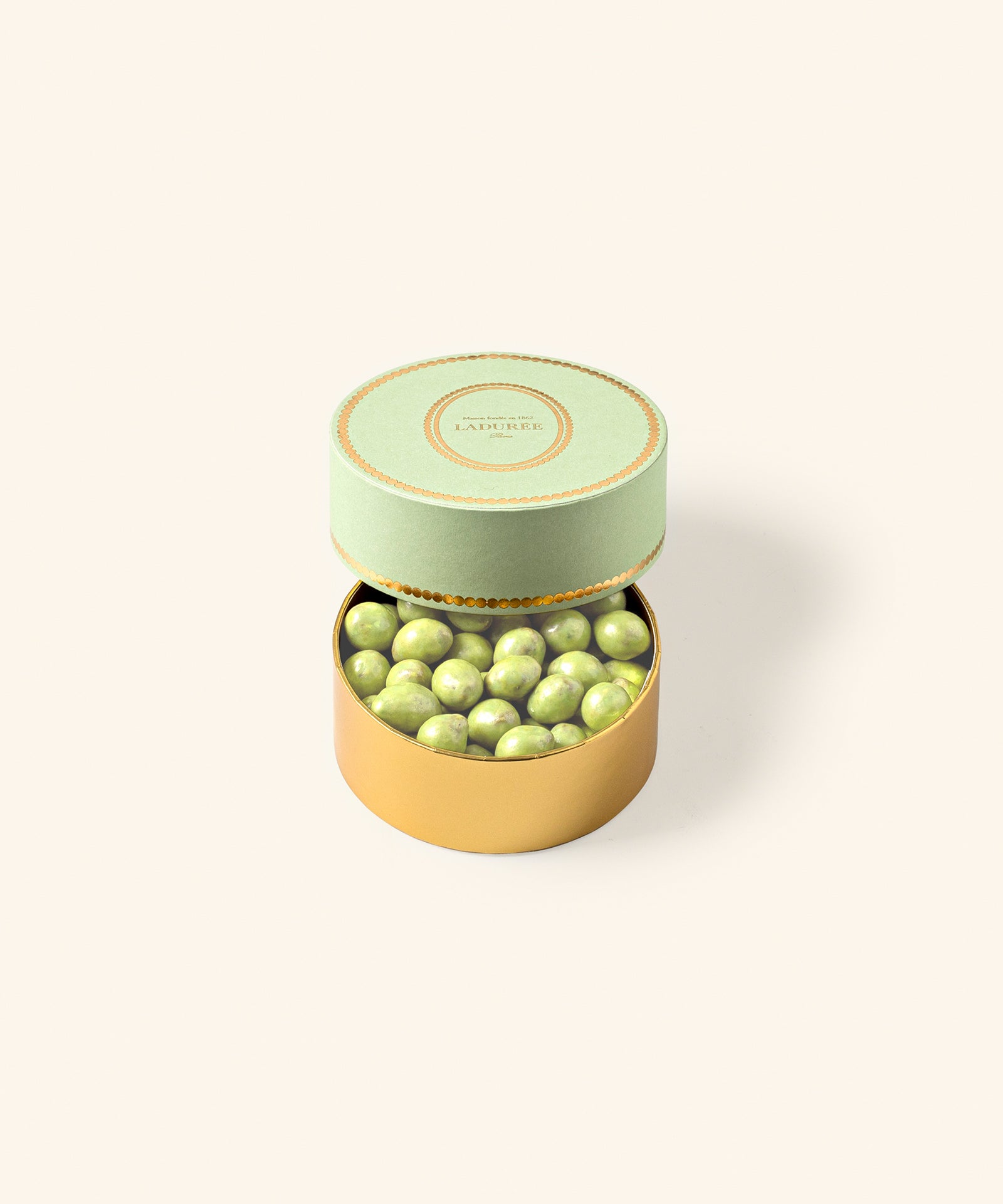 Box of pistachio and orange blossom chocolate pearls